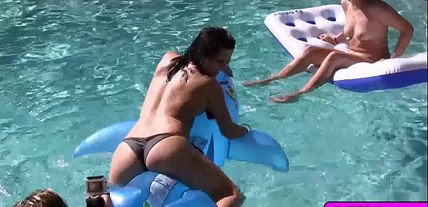  Gorgeous lesbian babes enjoy a hot pool party